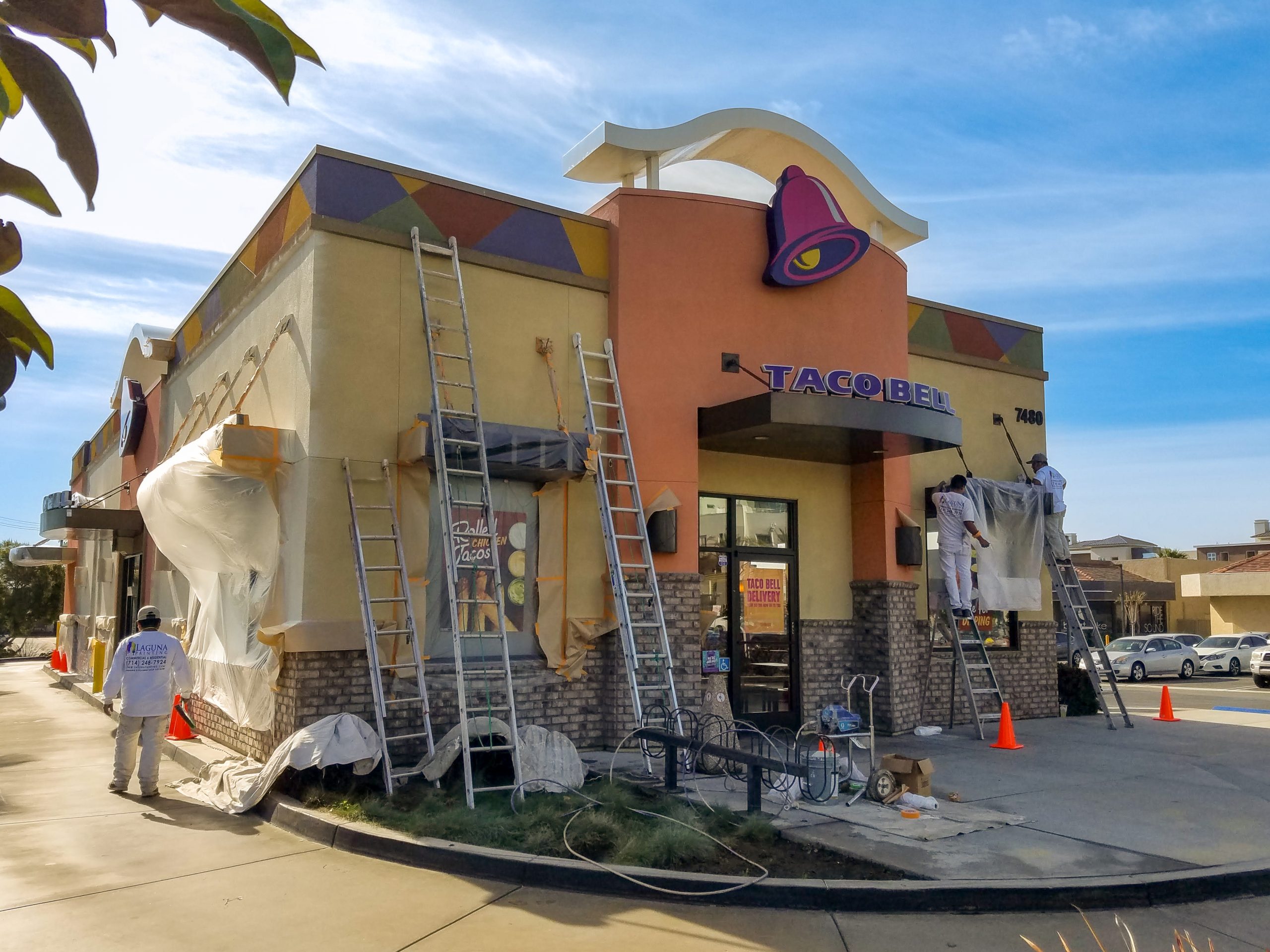 Taco Bell Building being painted by Laguna Painting. Commercial Painters